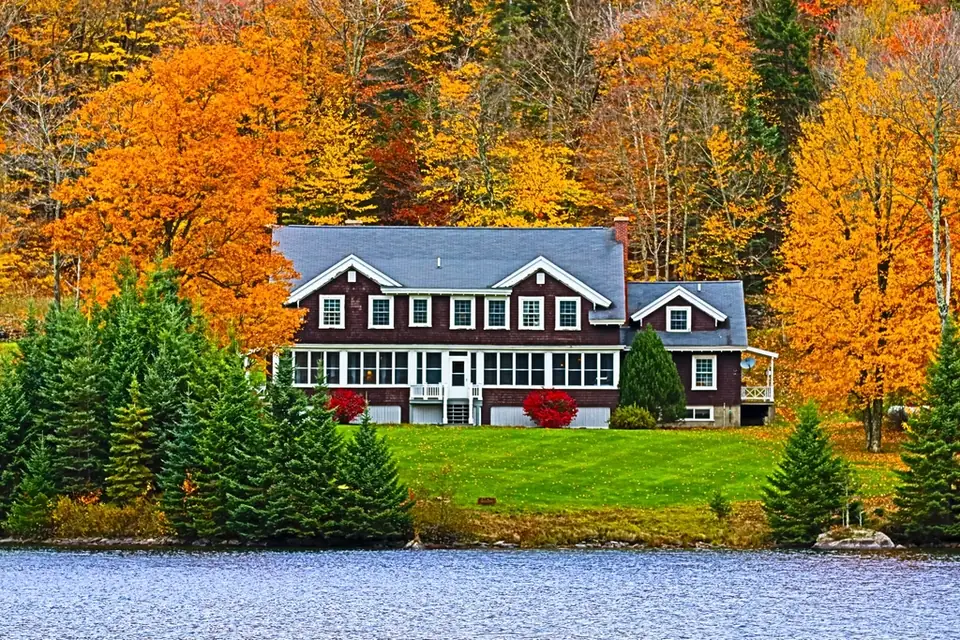 House surrounded by trees in autumn colors